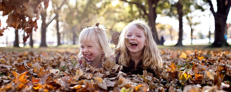 Playing in the Autumn Leaves, the best fun for a Family Portrait