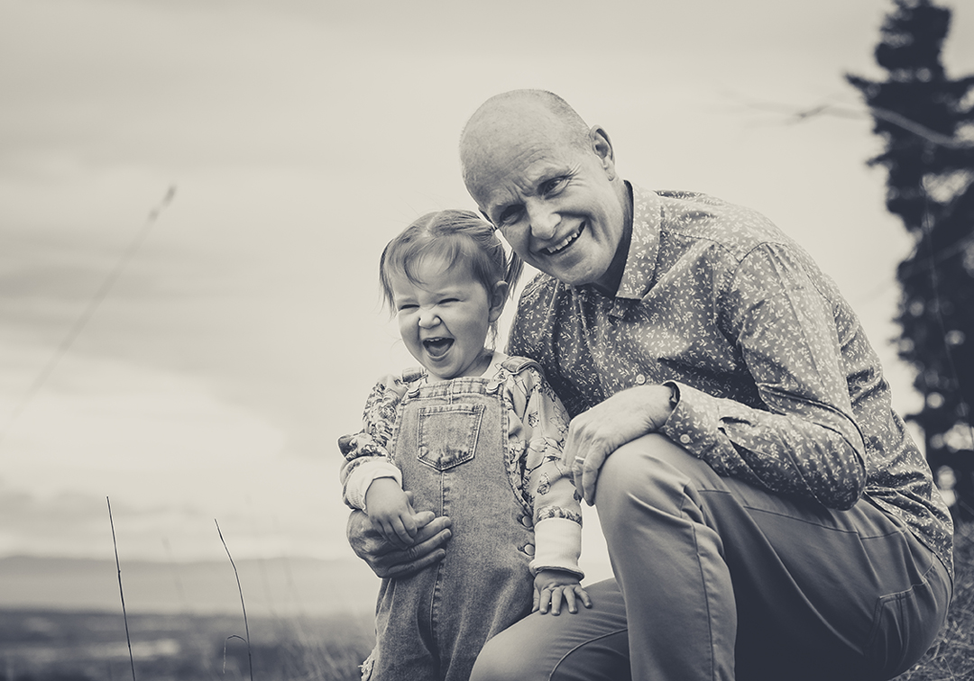 Family Portraits in Italy. Family Portraits in Rome, Naples, and Amalfi Coast. Family Friendly Activities in Italy. Best Italian Photographer. Family portraits with grandparents in italy, grandfather and granddaughter laughing.